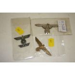 THREE GERMAN EAGLE BADGES