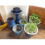 A QUANTITY OF BLUE CERAMIC PLANT POTS TOGETHER WITH A BIRD BATH