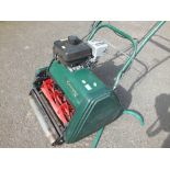 A KENSINGTON PETROL LAWNMOWER WITHOUT BOX