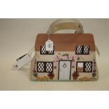 A CICCIA 'COUNTRY COTTAGE' GRAB BAG IN CREAM, complete with dust bag, together with a matching