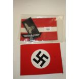 TWO GERMAN MILITARY ARM BANDS TOGETHER WITH TWO NAZI STYLE BADGES