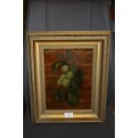 AN UNSIGNED OIL ON BOARD STILL LIFE STUDY OF FRUIT ON A BRANCH BEFORE A WALL