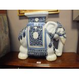 A LARGE DECORATIVE CERAMIC ELEPHANT