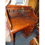 AN EARLY 20TH CENTURY OAK TAMBOUR FRONTED SINGLE PEDESTAL ROLL TOP DESK, the 'S' tambour opening