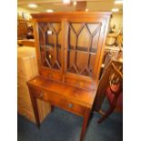 A SMALL REPRODUCTION MAHOGANY LADIES DESK H 138 W 62 CM