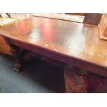 A JACOBEAN STYLE OAK LIBRARY TYPE TABLE, the rectangular top with a smaller central inset leather