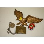 A GERMAN MILITARY STYLE BELT BUCKLE TOGETHER WITH ANOTHER ETC TOGETHER WITH A METAL EAGLE