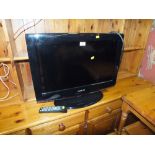 A SAMSUNG 26" FLATSCREEN TV - REMOTE - HOUSE CLEARANCE