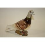 A BROWN BESWICK PIGEON FIGURE 1383