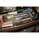 A COLLECTION OF CDS TOGETHER WITH A SMALL QUANTITY OF 7" SINGLES