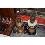 FOUR OIL LAMPS