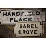 A LARGE CAST STREET SIGN FOR HANDFIELD PLACE TOGETHER WITH A SMALLER EXAMPLE FOR ISABEL GROVE -