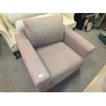 A MODERN UPHOLSTERED SUEDE ARMCHAIR