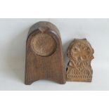 A FOLDING CARVED WOOD TRAVELLING POCKET WATCH STAND CASE, H 10 cm together with a plain wooden