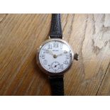 ROLEX, A WWI ERA SILVER TRENCH WATCH, London import marks for 1915, white enamel dial with Arabic