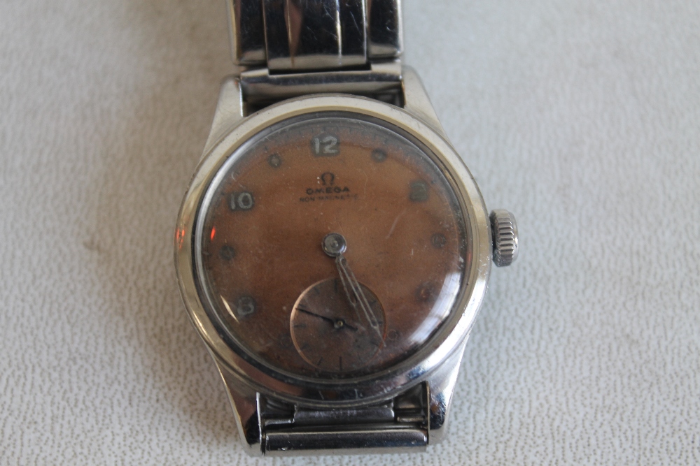 A 1940S OMEGA NON MAGNETIC WRISTWATCH WITH UNUSUAL REAL COPPER DIAL (AS USED BY PEOPLE WORKING IN - Image 2 of 3