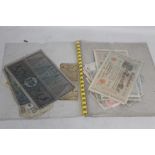 A COLLECTION OF WORLD BANKNOTES, to include issues from China, Hong Kong, Austria, Germany, Denmark,