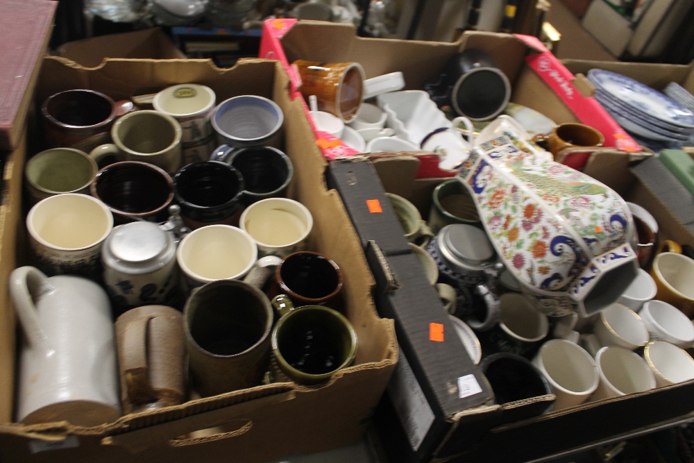 THREE TRAYS OF MAINLY MUGS TO INCLUDE STONEWARE EXAMPLES, COMMEMORATIVE MUGS ETC.