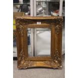 A GILT PICTURE FRAME