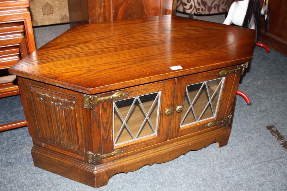 AN OLD CHARM OAK TV CABINET