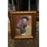 A GILT FRAMED AND GLAZED WATERCOLOUR DEPICTING A SEATED GENTLEMAN