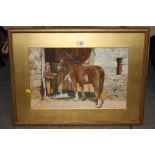 A GILT FRAMED AND GLAZED WATERCOLOUR DEPICTING A BOY FEEDING A HORSE SIGNED J.S. MORLAND