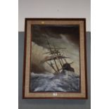 A FRAMED OIL ON CANVAS DEPICTING A SHIP IN A STORMY SEA INITIALLED C G