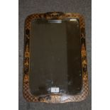 AN ORIENTAL CHINOISERIE FRAMED WALL HANGING MIRROR