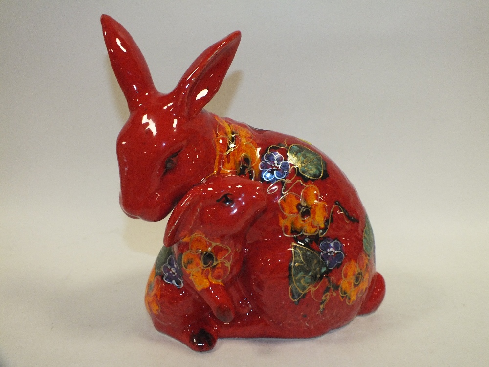A LARGE SIGNED ANITA HARRIS POTTERY RABBIT AND BUNNY FIGURE