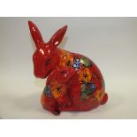 A LARGE SIGNED ANITA HARRIS POTTERY RABBIT AND BUNNY FIGURE