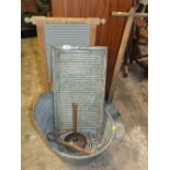 A GALVANISED RUB - A - TUB TOGETHER WITH WASHBOARDS ETC.