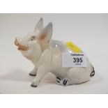 A BESWICK SEATED PIG FIGURE