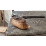 A VICTORIAN NOVELTY NAIVE TREEN WOODEN SNUFF BOX IN THE FORM OF A SHOE / CLOG WITH REMOVABLE LID