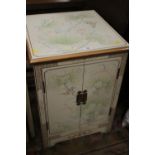 A CHINESE STYLE TWO DOOR CABINET