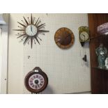 FOUR VINTAGE WALL CLOCKS TO INCLUDE A SUNBURST EXAMPLE, POSTMANS CLOCK ETC