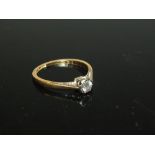 AN 18 CARAT GOLD DIAMOND SOLITAIRE RING