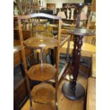 AN OAK DUMB WAITER. STICKSTAND, OCCASIONAL TABLE PLUS TWO TORCHERES (5)