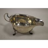 A HALLMARKED SILVER SAUCE BOAT