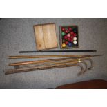 A COLLECTION OF VINTAGE WALKING STICKS AND CANES TO INCLUDE WHITE METAL TOPPED EXAMPLES TOGETHER WIT