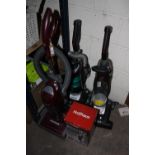 THREE HOOVER VACUUMS PLUS ANOTHER