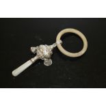 A HALLMARKED SILVER AND MOTHER OF PEARL TEETHING RATTLE