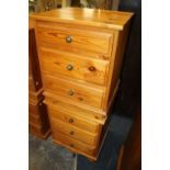 A PAIR OF HONEY PINE THREE DRAWER BEDSIDE CHEST - W 52 CM (2)