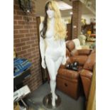 A FULL SIZED SHOP DISPLAY MANNEQUIN