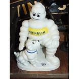 ***A MODERN CAST METAL MICHELIN MAN AND DOG FIGURE