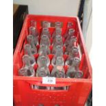 A VINTAGE COCA-COLA CRATE WITH ASSORTED VINTAGE COCA-COLA BOTTLES