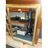 A LARGE MODERN GILT FRAMED BEVEL EDGED MIRROR