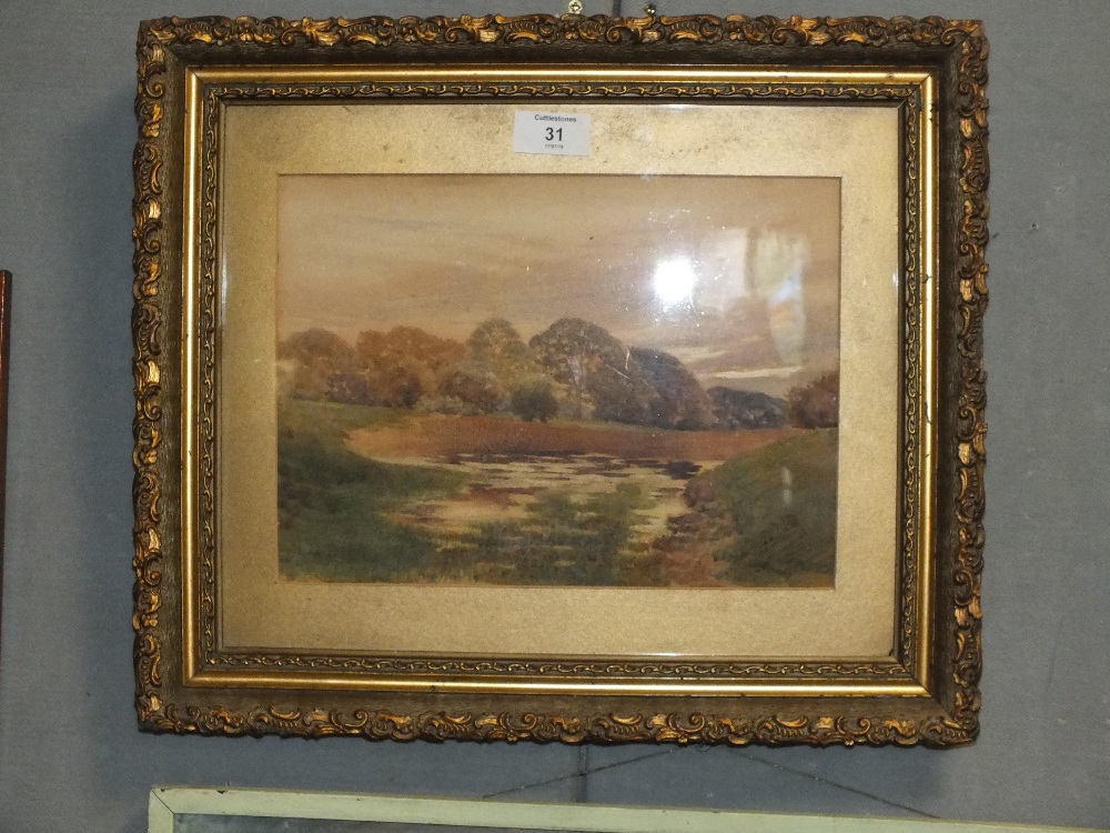 E. LAMBERT. A 20th century wooded river landscape, signed lower left, watercolour, framed and