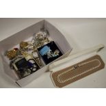 A BOX OF COSTUME JEWELLERY