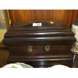 A VINTAGE OAK LIDDED CASKET