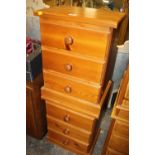 A PAIR OF HONEY PINE THREE DRAWER BEDSIDE CHESTS - W 46 CM (2)